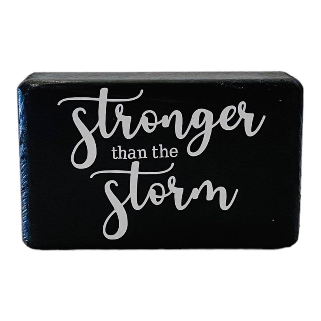 'STRONGER THAN THE STORM' WOOD BLOCK SIGN [BLACK]
